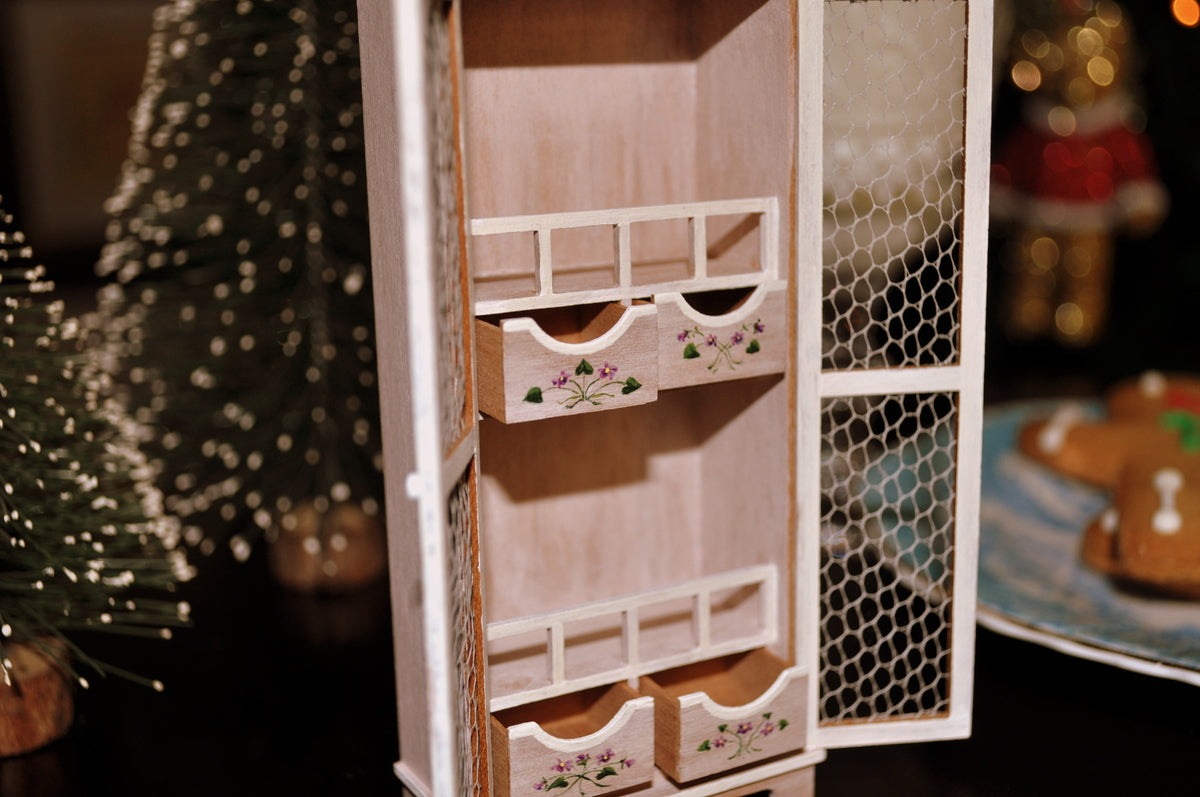 Estate Treasure: Bunnies Cabinet by Karen Markland